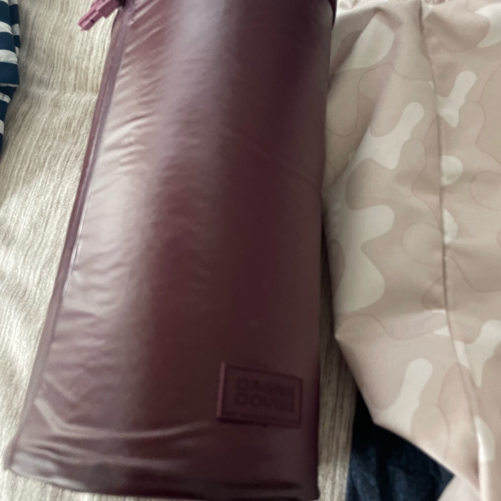 Dagne dover toiletry bag new. Burgundy color